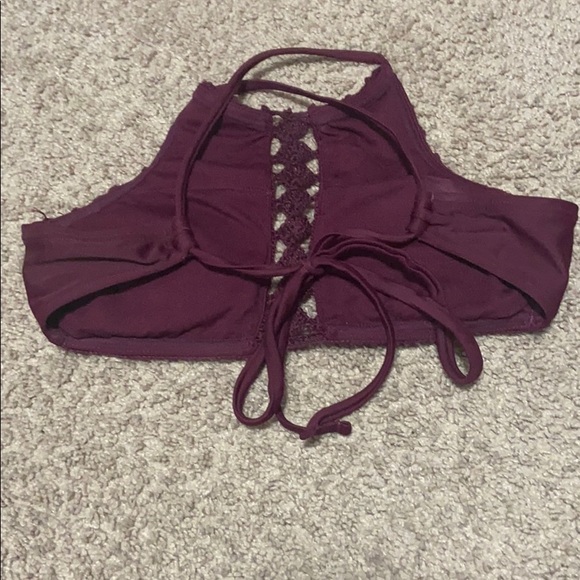 A purple swim top. - Picture 2 of 3